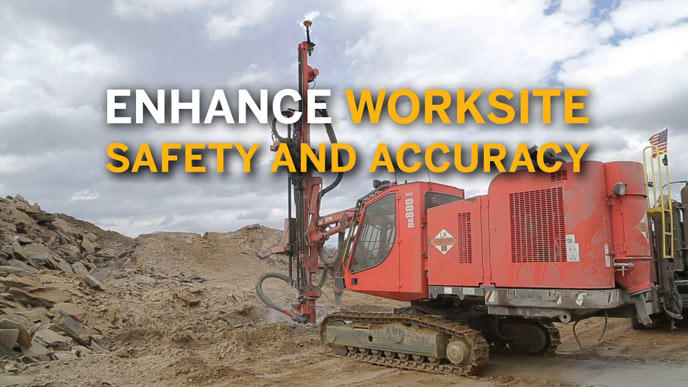 Piling machine driving poles into ground